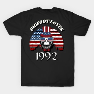 Bigfoot loves America and People born in 1992 T-Shirt